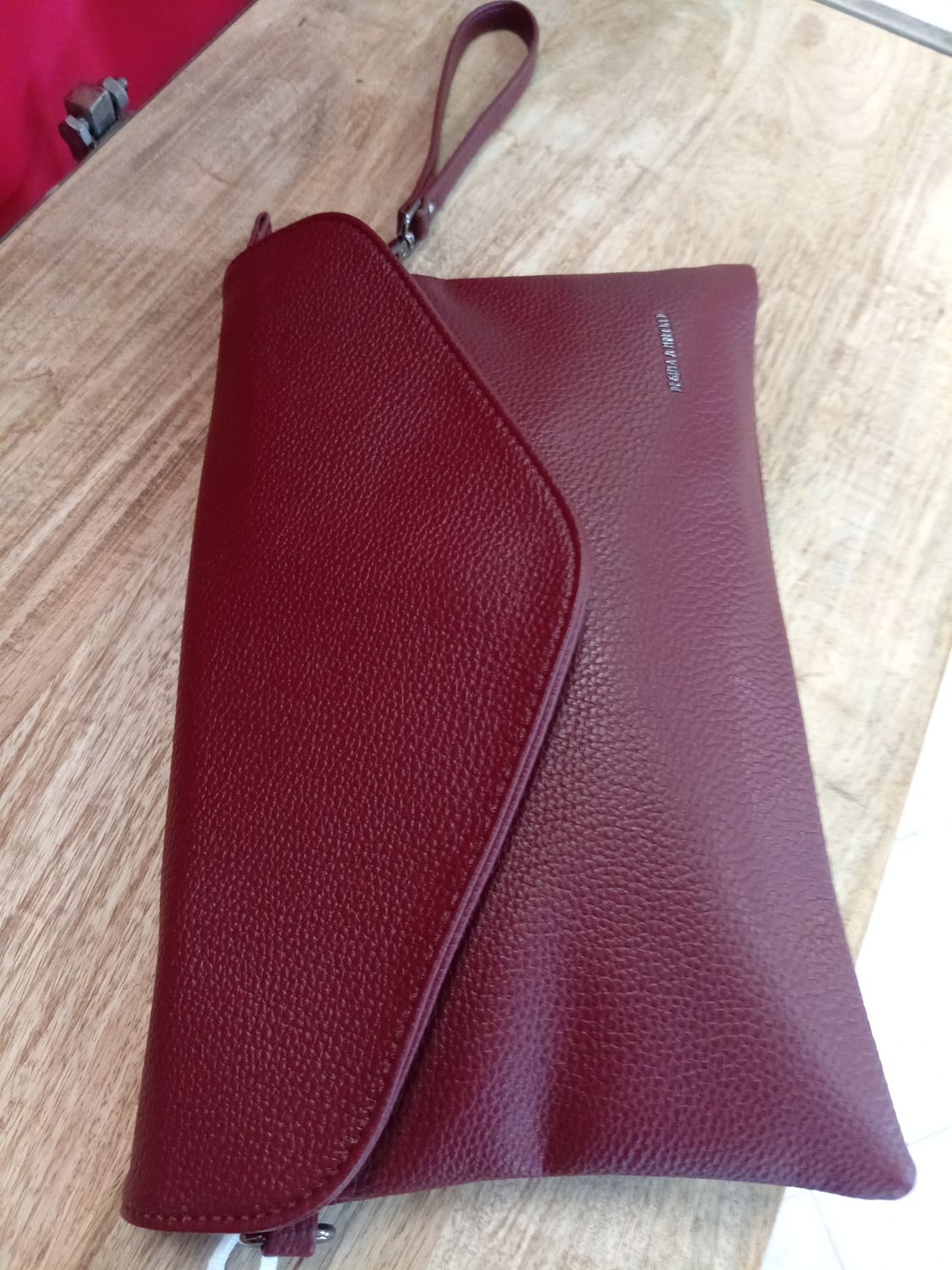 Borsa più tracolla  mano