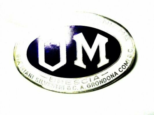 O.M. badge