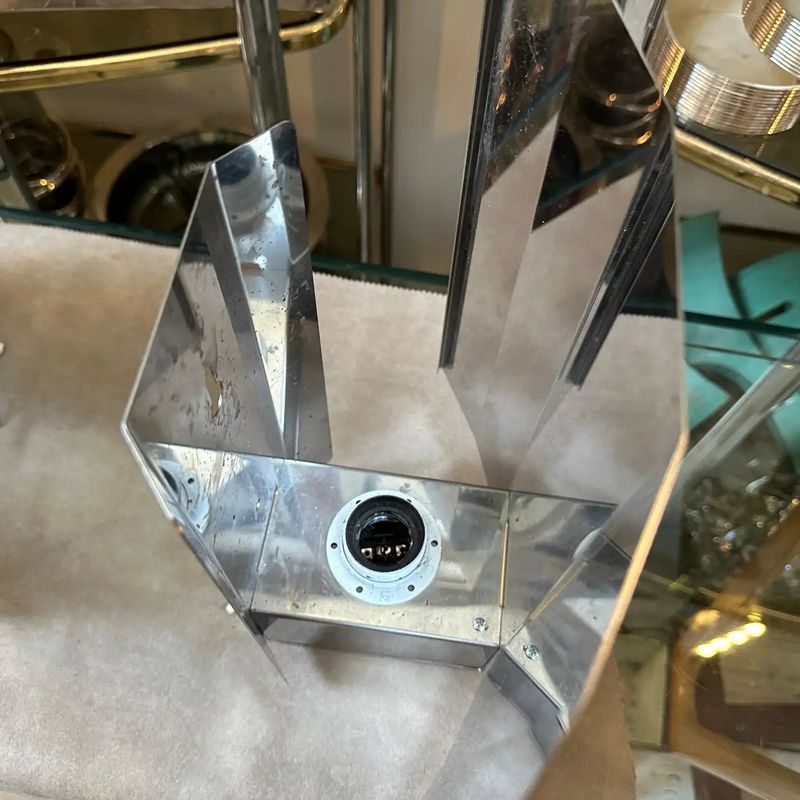 A pair of 1980s Modern Steel Italian Ambient Light Wall Sconces