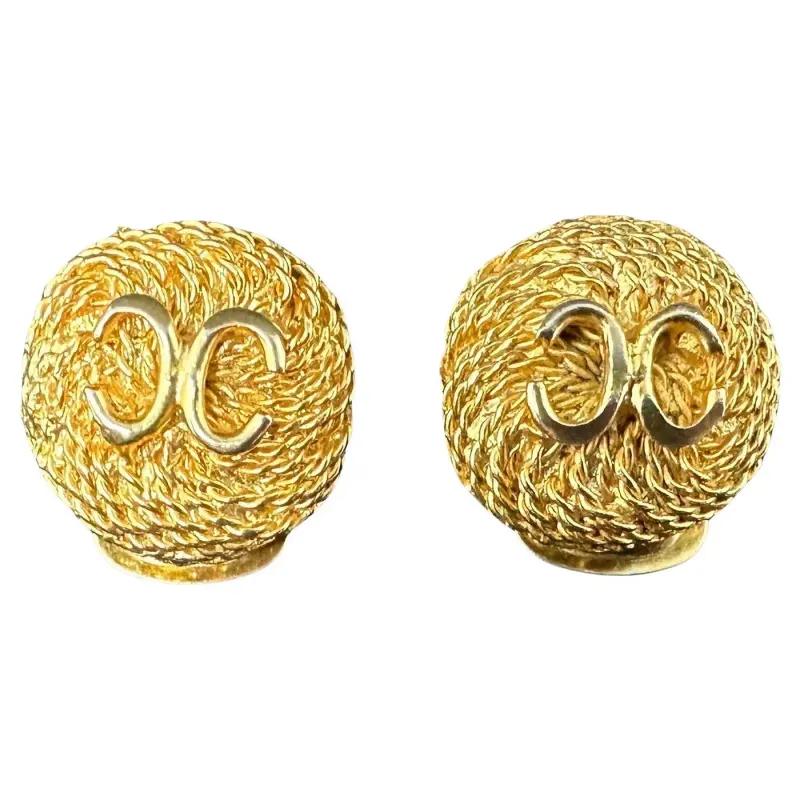 An Iconic Pair of 1960s Chanel Clip-on Button Earrings