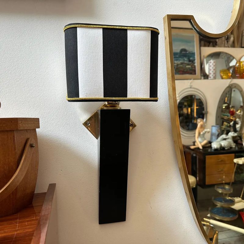 An Elegant 1980s Art Deco Style Black Painted Wood and Brass Italian Wall Sconce