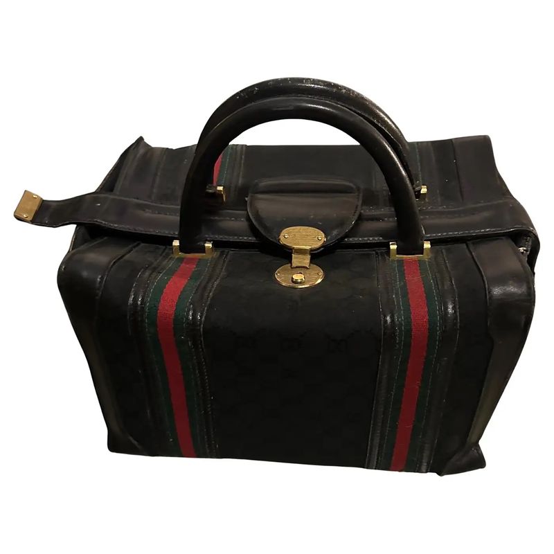 An Elegant 1980s Leather Small Travel Bag By Gucci