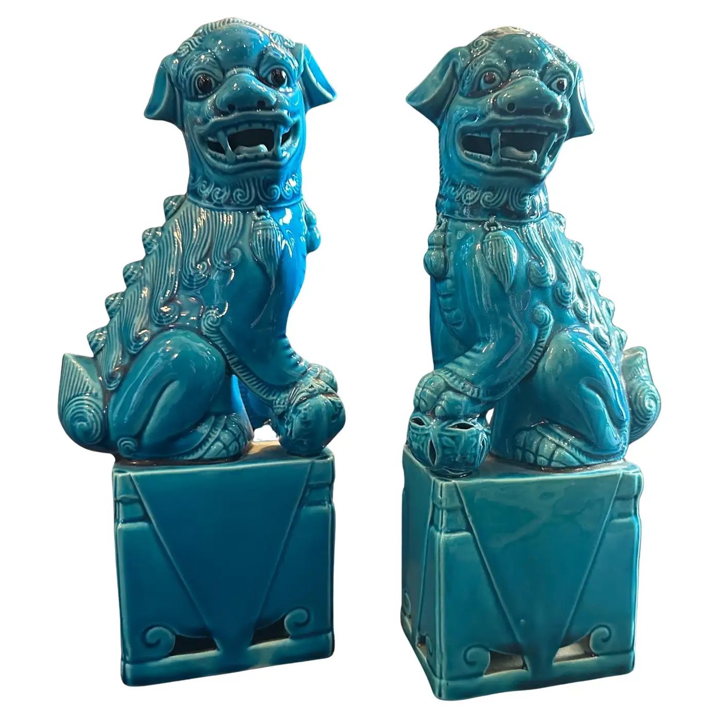 A pair of 1960s Turquoise Glazed Ceramic Chinese Pho Dogs