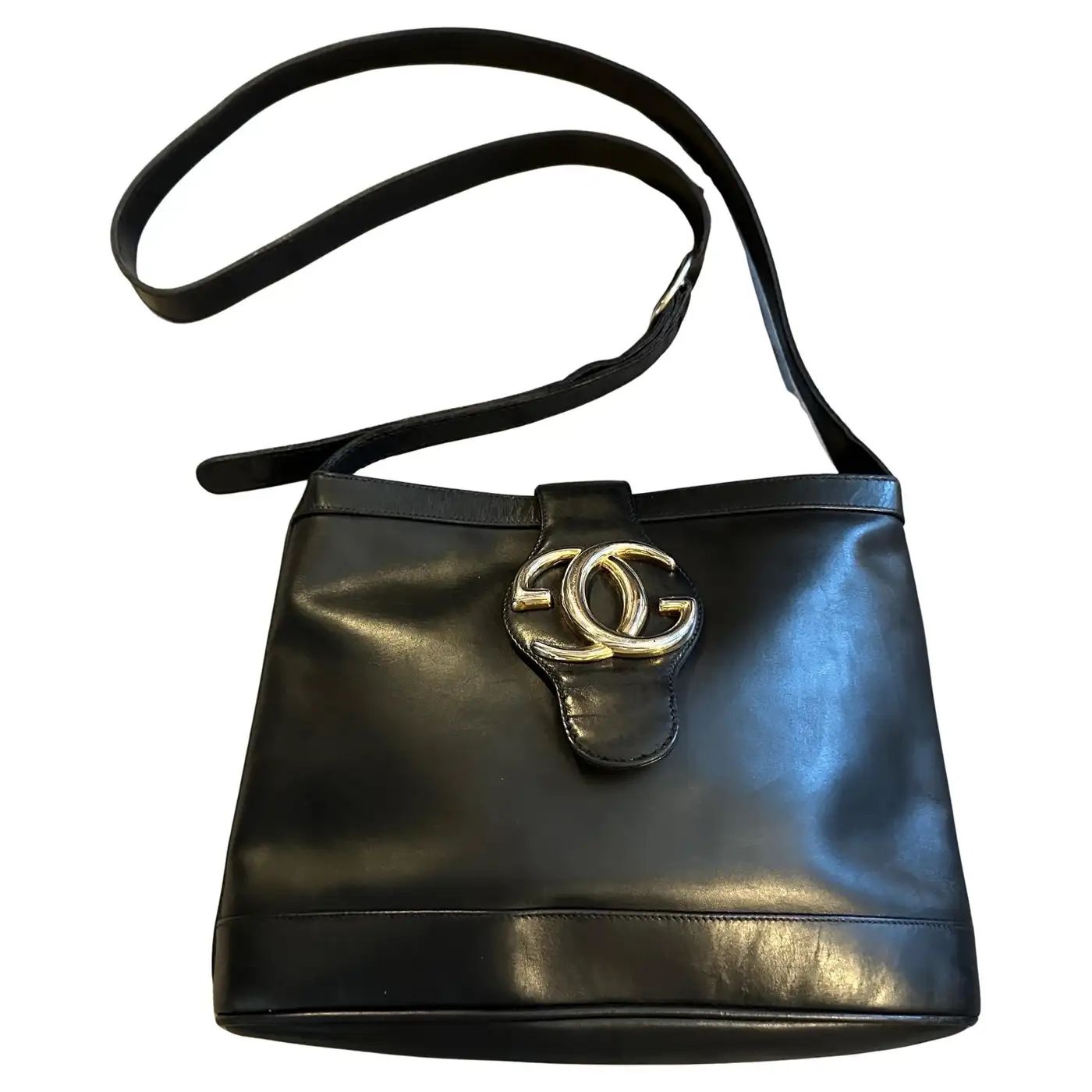 An Elegant 1970s Black Leather and Brass Bucket Shoulder Bag by Gucci