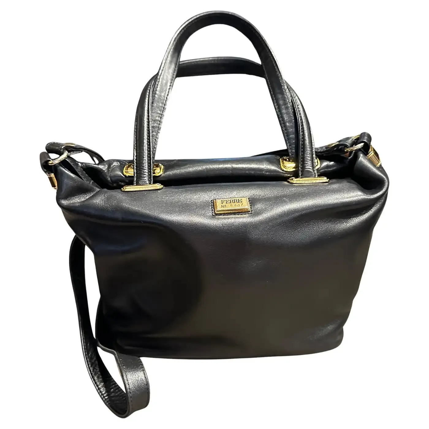 A 1990s elegant Black Leather and Brass Italian Hand-Bag by Gianfranco Ferrè