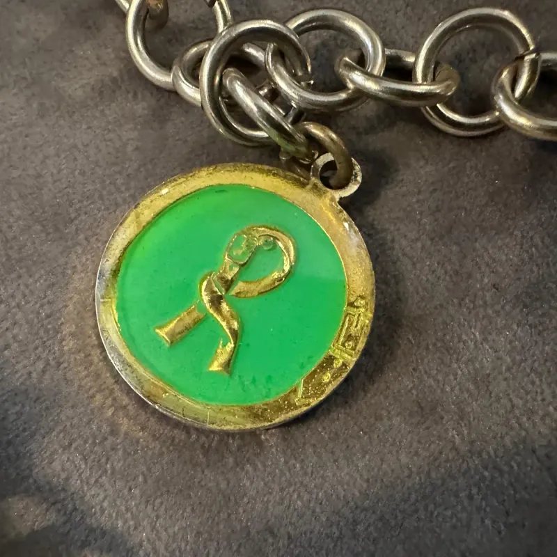 1990s Costume Jewelry Green Logo Chain Necklace by Roberta di Camerino