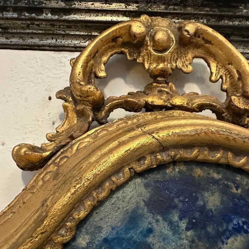 A Baroque Style Gilded Wood Box Frame Displaying a White Porcelain Christ