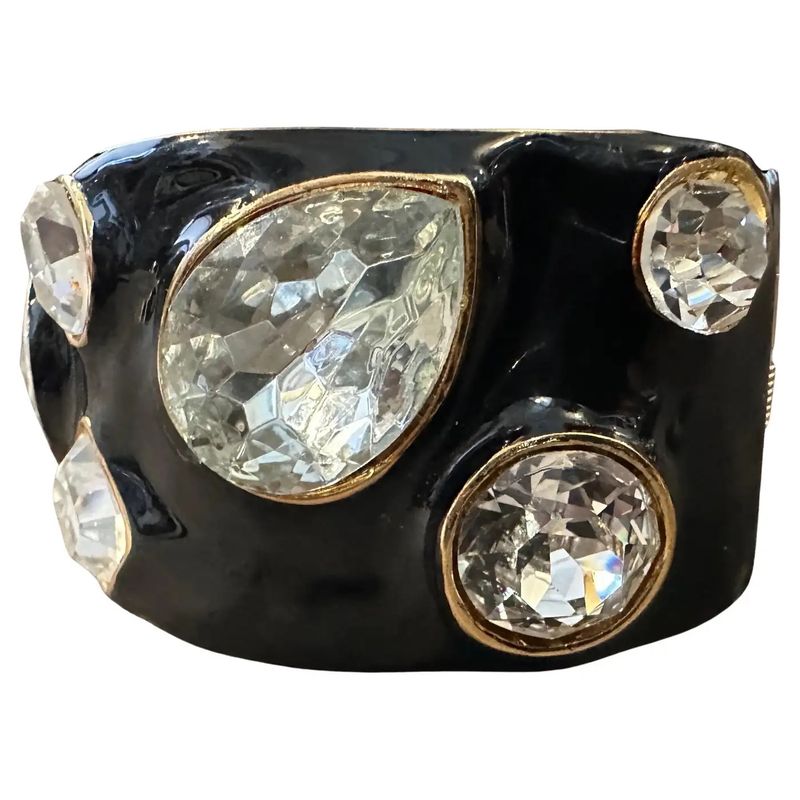 A 2000s Black Enamel Brass and Rhinestone Bangle Bracelet by Kenneth Jay Lane