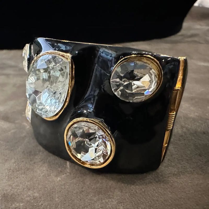 A 2000s Black Enamel Brass and Rhinestone Bangle Bracelet by Kenneth Jay Lane
