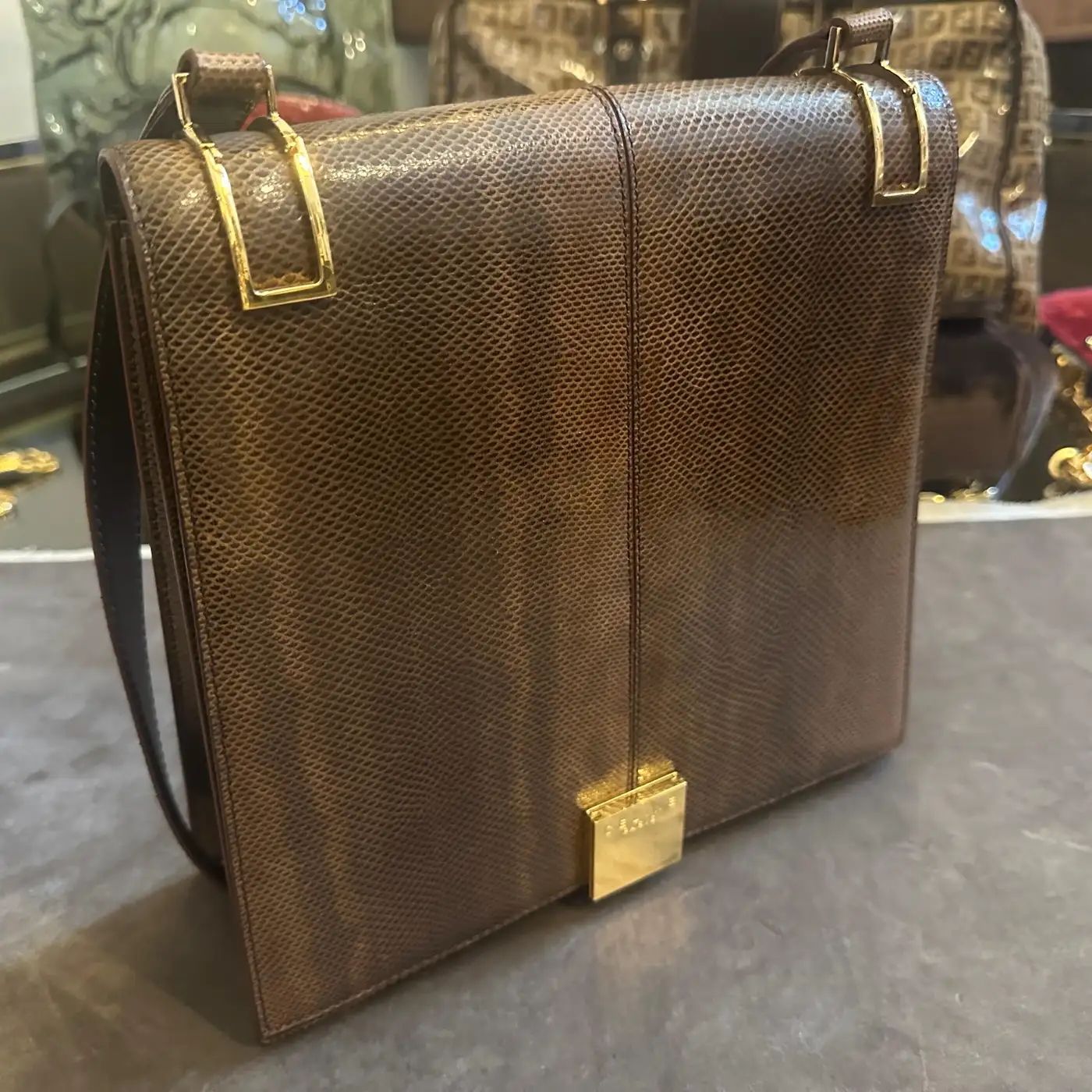 1990s Elegant High Quality Brown Leather and Brass Shoulder Bag by Celine Paris