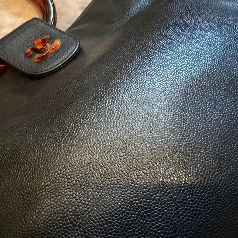 A Rare 2000s Black Caviar Leather and Bakelite Top Handle Bag By Chanel