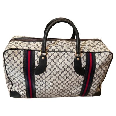 An Iconic 1980s Gucci Vintage Monogram Canvas Travel Bag