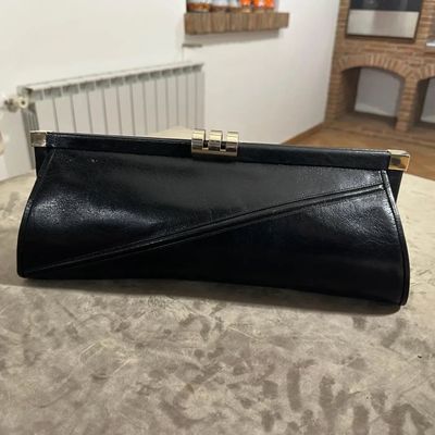 An Elegant 1960s Black leather and Brass Clasp Italian Clutch Bag