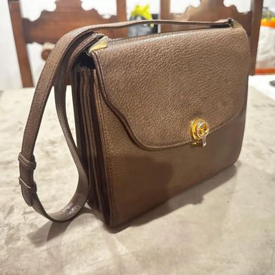 An Elegant 1970s Brown Leather and Brass Hardware Shoulder Bag by Gucci