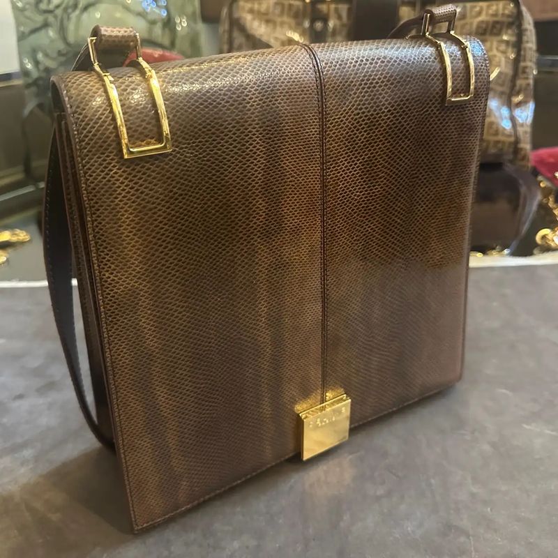 1990s Elegant High Quality Brown Leather and Brass Shoulder Bag by Celine Paris