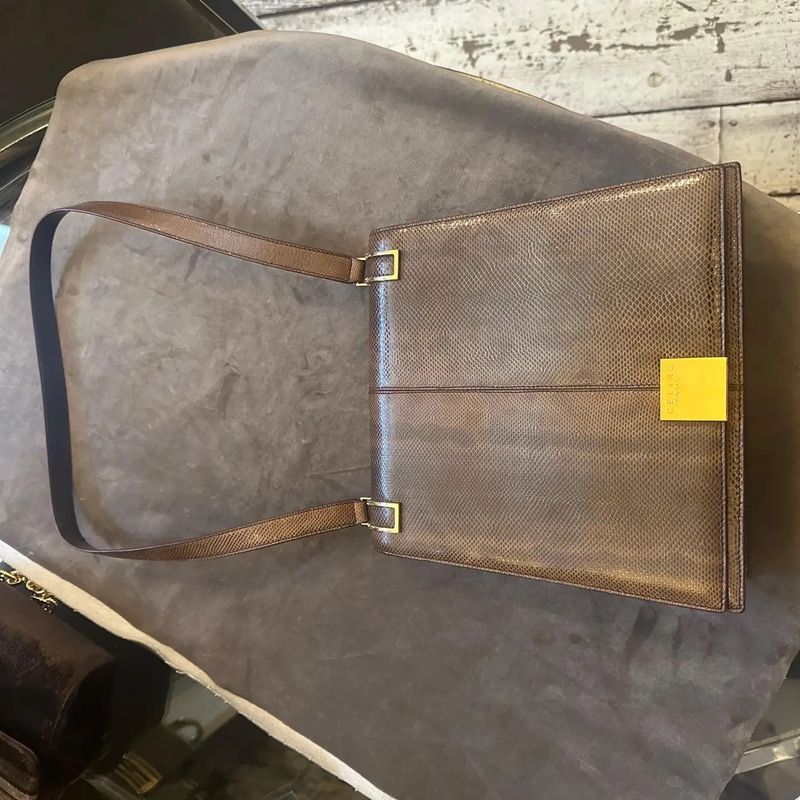 1990s Elegant High Quality Brown Leather and Brass Shoulder Bag by Celine Paris