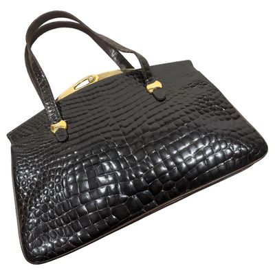 An Elegant 1960s Vintage Dark Brown Leather and Brass Clasp Italian Hand-Bag