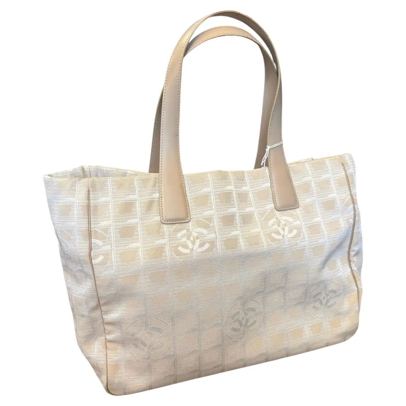 A 2003 Chanel New Travel Line Beige Nylon and Brown Leather Tote Bag A 2003 Chanel New Travel Line Beige Nylon and Brown Leather Tote Bag