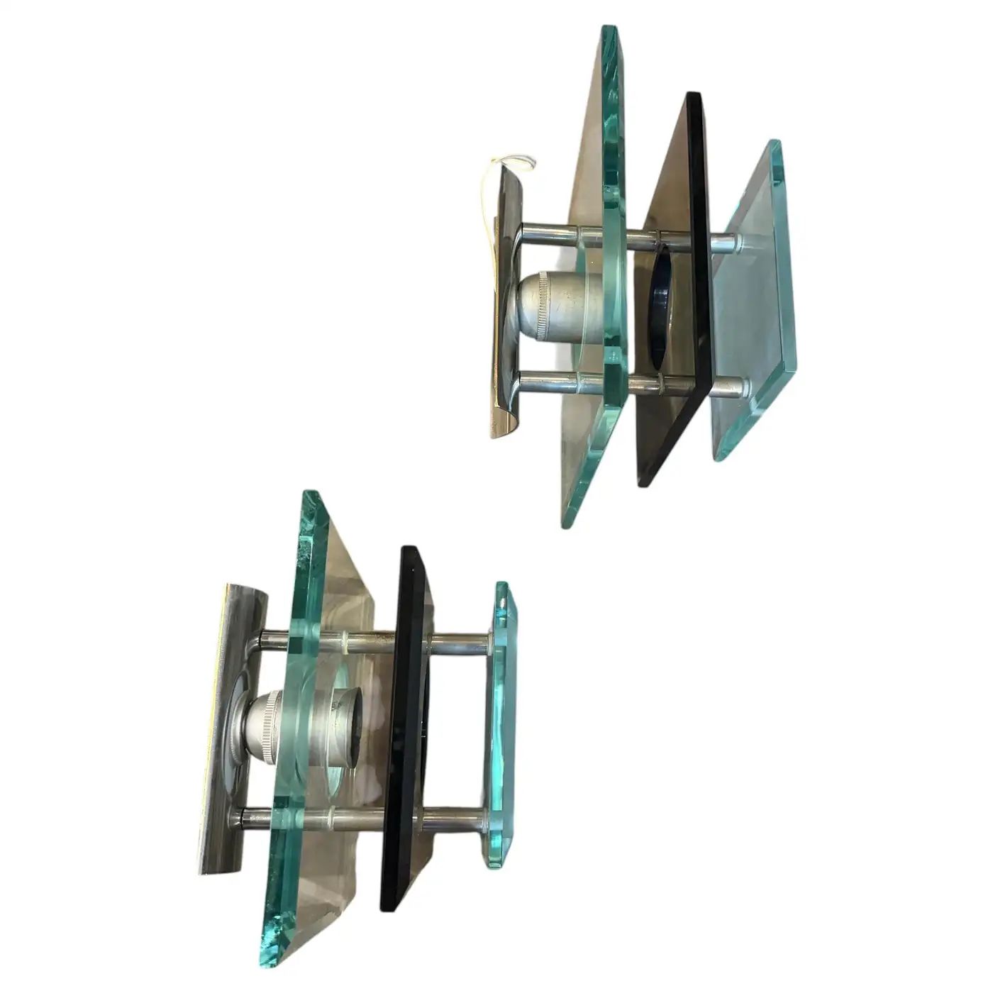 Two 1960s Space Age Steel and Heavy Glass Wall Sconces by Veca Two 1960s Space Age Steel and Heavy Glass Wall Sconces by Veca