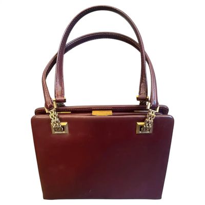 A 1960s Gucci Vintage Red Leather and Brass Hardware Evening Bag