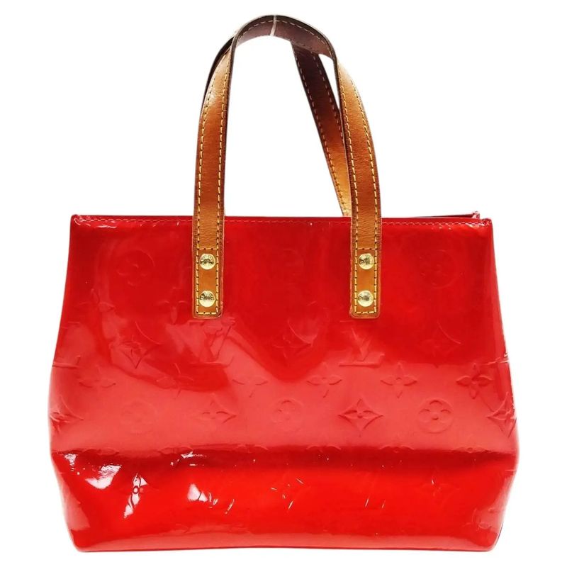 A 2004 Louis Vuitton Red Vernis Patent Leather and Vachetta Reade Hand-Bag