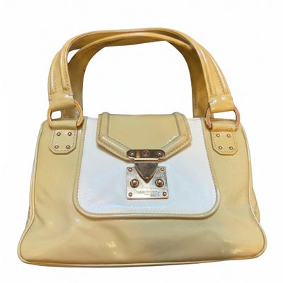 A Vintage Louis Vuitton Beige and White Leather Cruise Hand-Bag