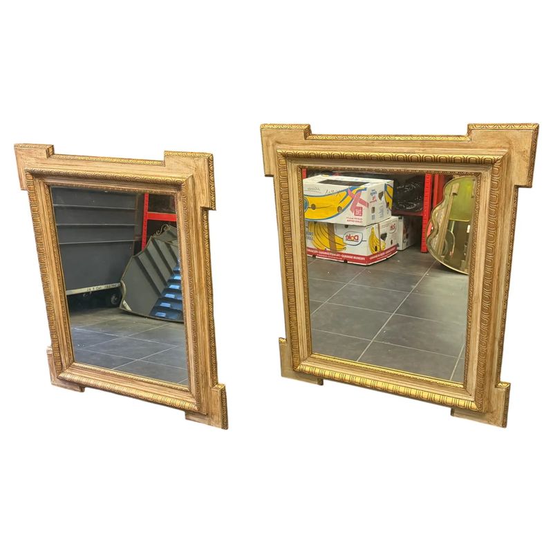 A Pair of Neoclassical Italian Wall Mirrors in Pickled and Gilded Wood.
