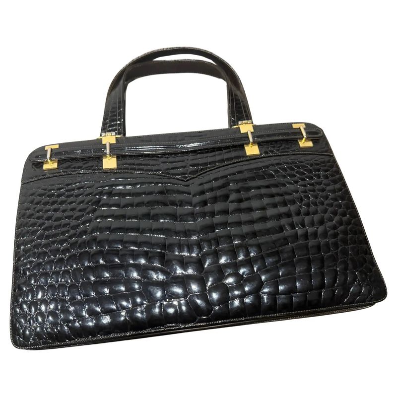 1970s Vintage Glossy Embossed Black Leather and Brass Italian Hand Bag