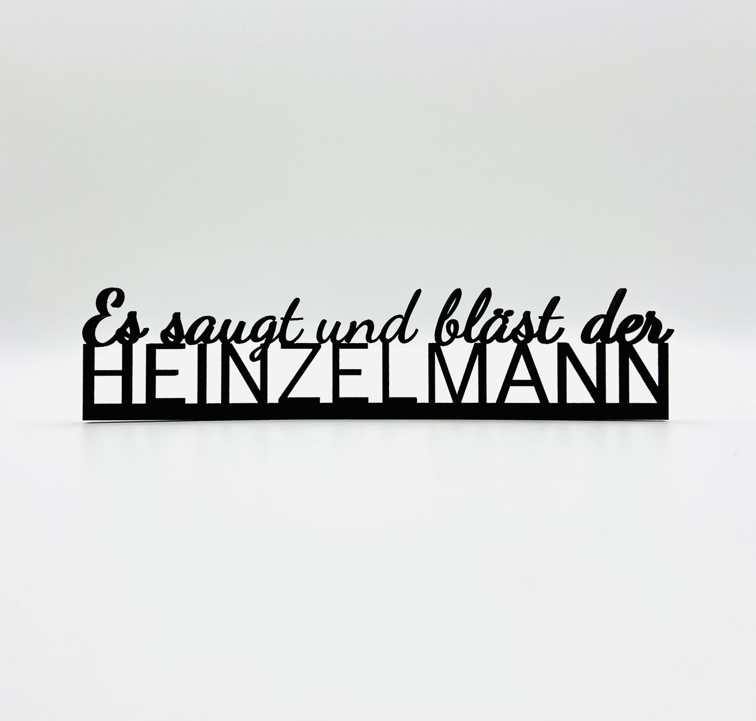 Schriftzug "Es saugt und bläst der Heinzelmann"