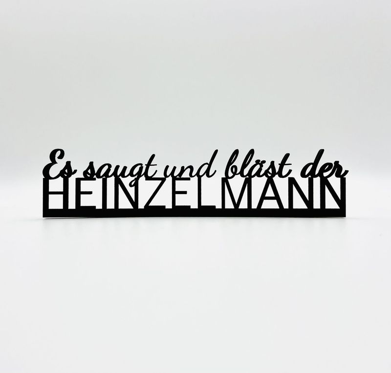 Schriftzug Schriftzug "Es saugt und bläst der Heinzelmann"