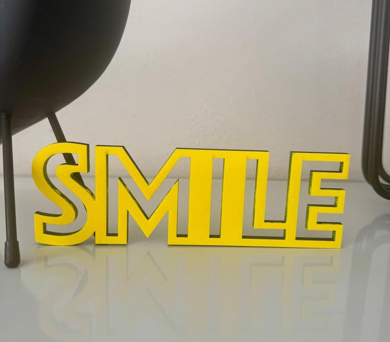 Schriftzug Schriftzug "SMILE"