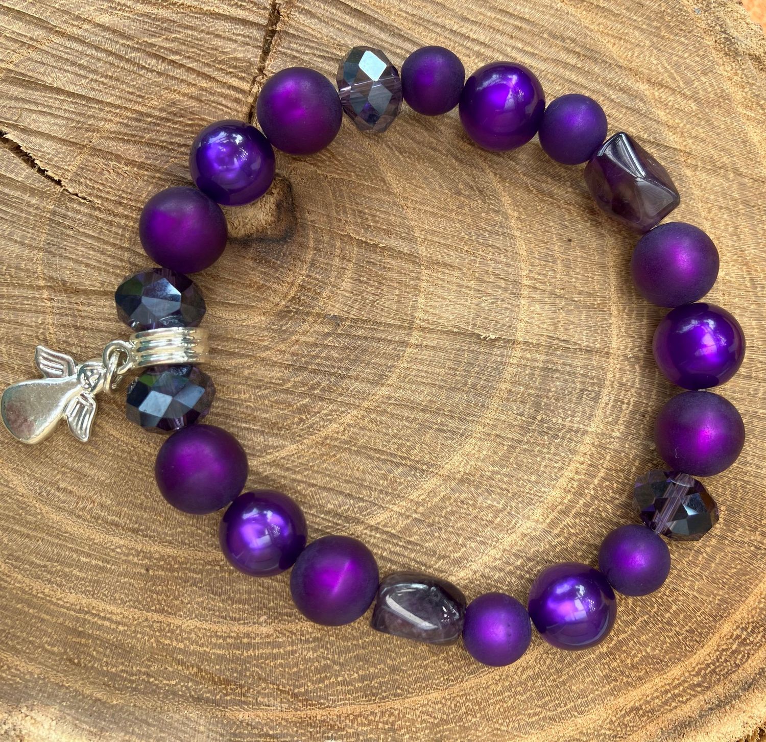 Armband lila Anhänger Engel