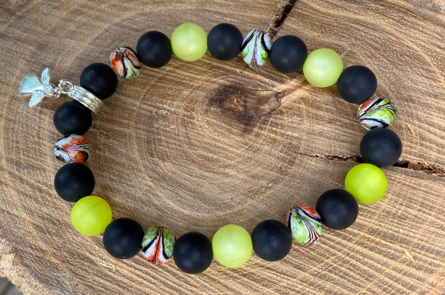Armband elastisch schwarz grün Anhänger Engel