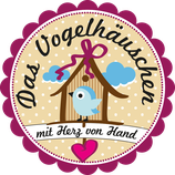 Tasse mit Vogelfutter