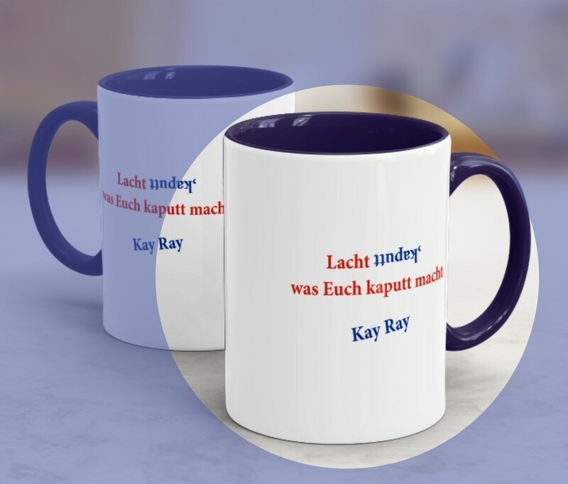 Kay Ray Tasse &quot;Lacht kaputt, was Euch kaputt macht&quot; in blau.