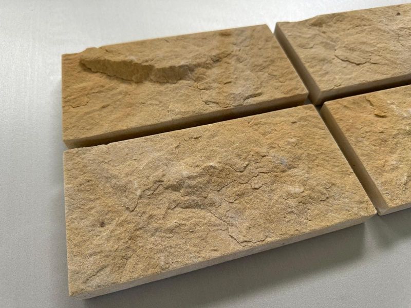 Pitched Face Coursed buff sandstone cladding slips