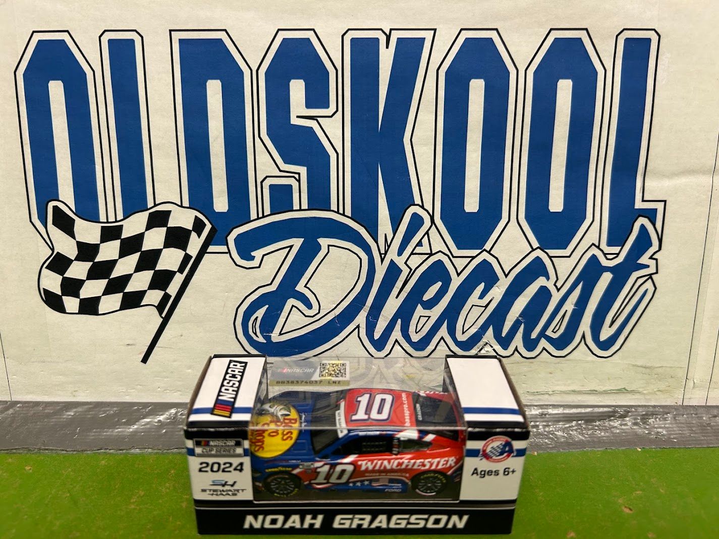 Noah Gragson #10 Bass Pro Shop Winchester 2024 1:64 cup