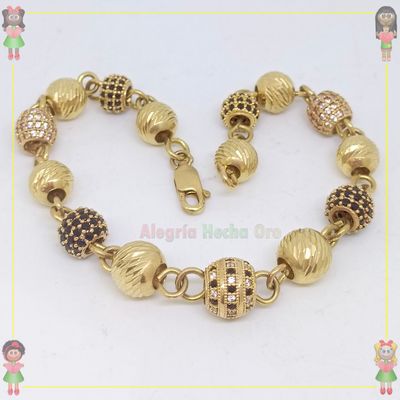 Pulsera Bolas de Fuego Oros 18k
