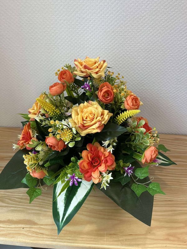 coussin de fleurs artificielles orange