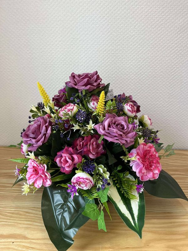 coussin de fleurs artificielles violet/rose