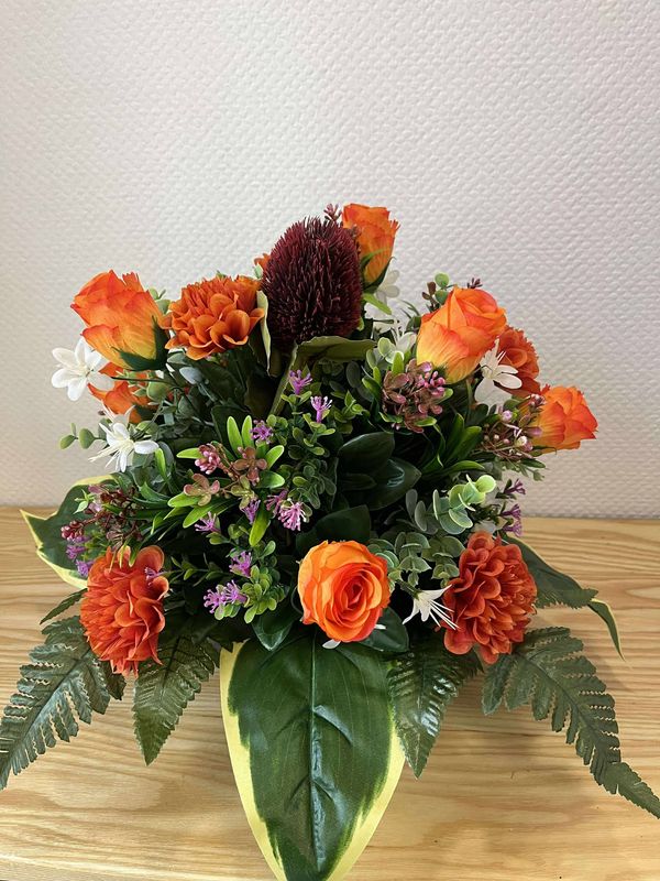 coussin de fleurs artificielles orange