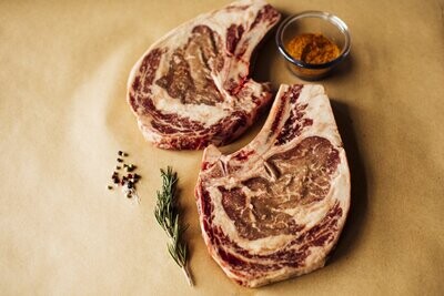 USDA CHOICE AGED ANGUS RIBEYE BONE-IN STEAKS