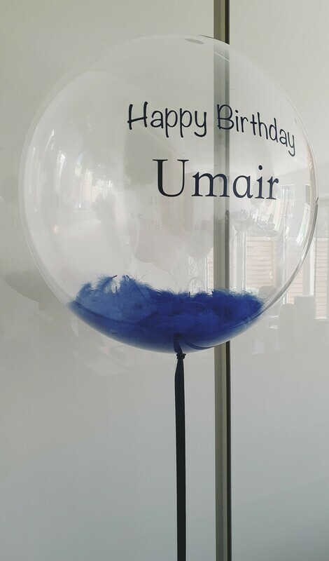 Helium filled personalised balloon with feathers inside. Arrives Inflated