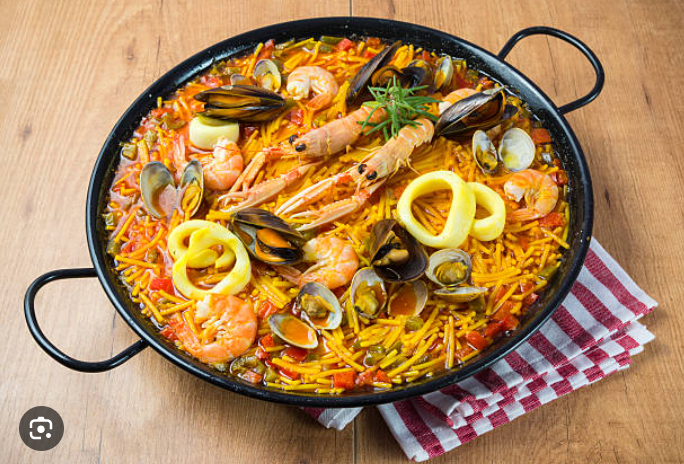 -Fidéua de fruits de mer (gambas, langoustine, calamars, moules )