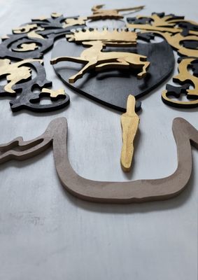 Réalisation armoiries en bois