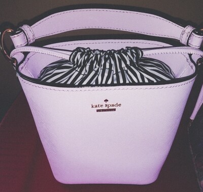 Pink and black Kate Spade mini bucket bag