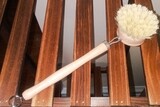 Long handled natural scrubber