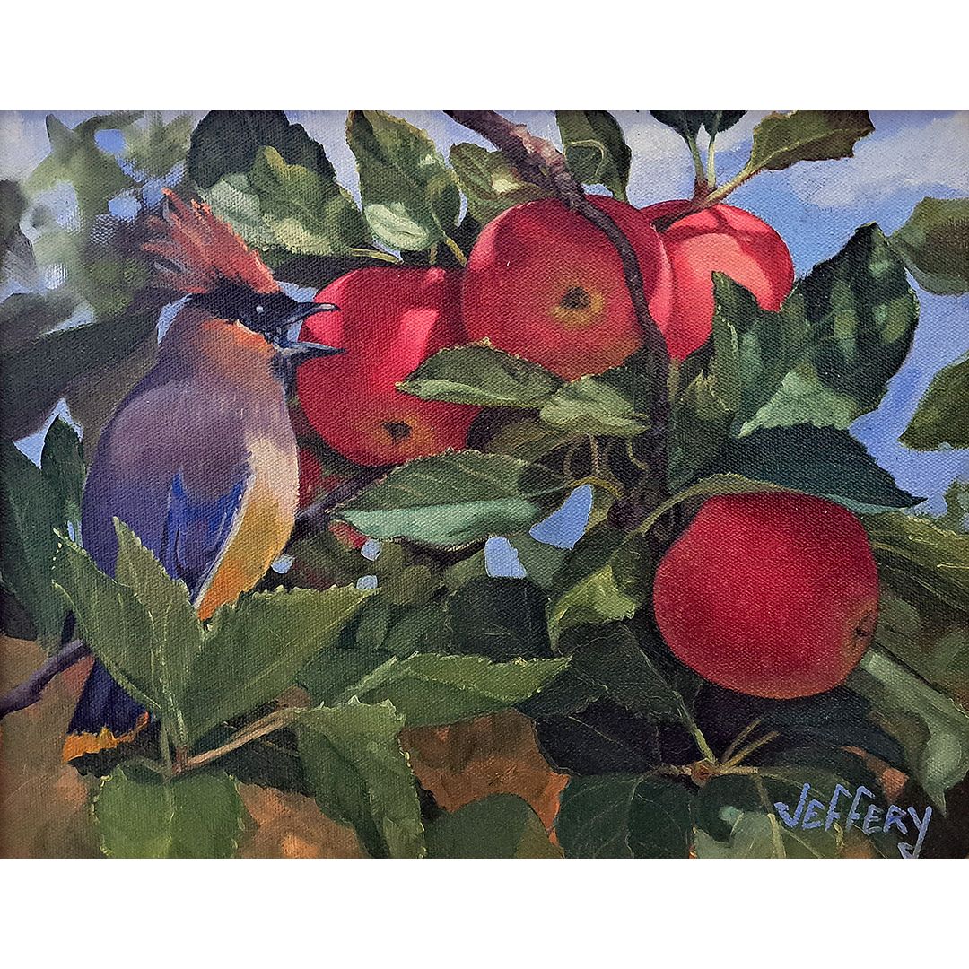 Waxwing in Red Apple Tree