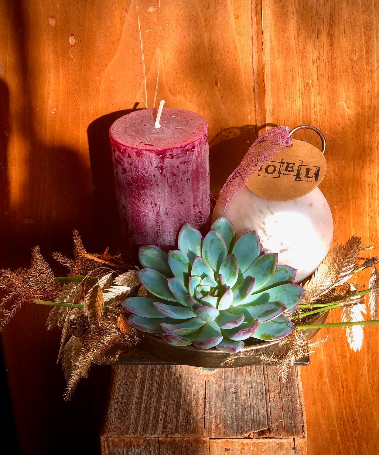 Arrangement avec bougie