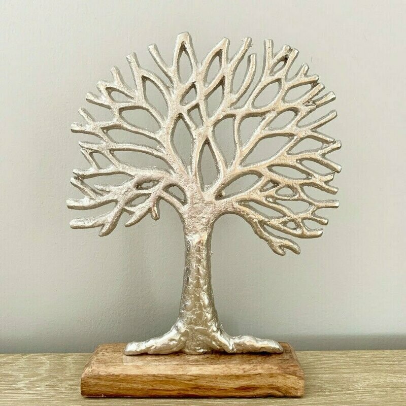 Shabby chic hammered metal Tree of Life ornament on wood base.
